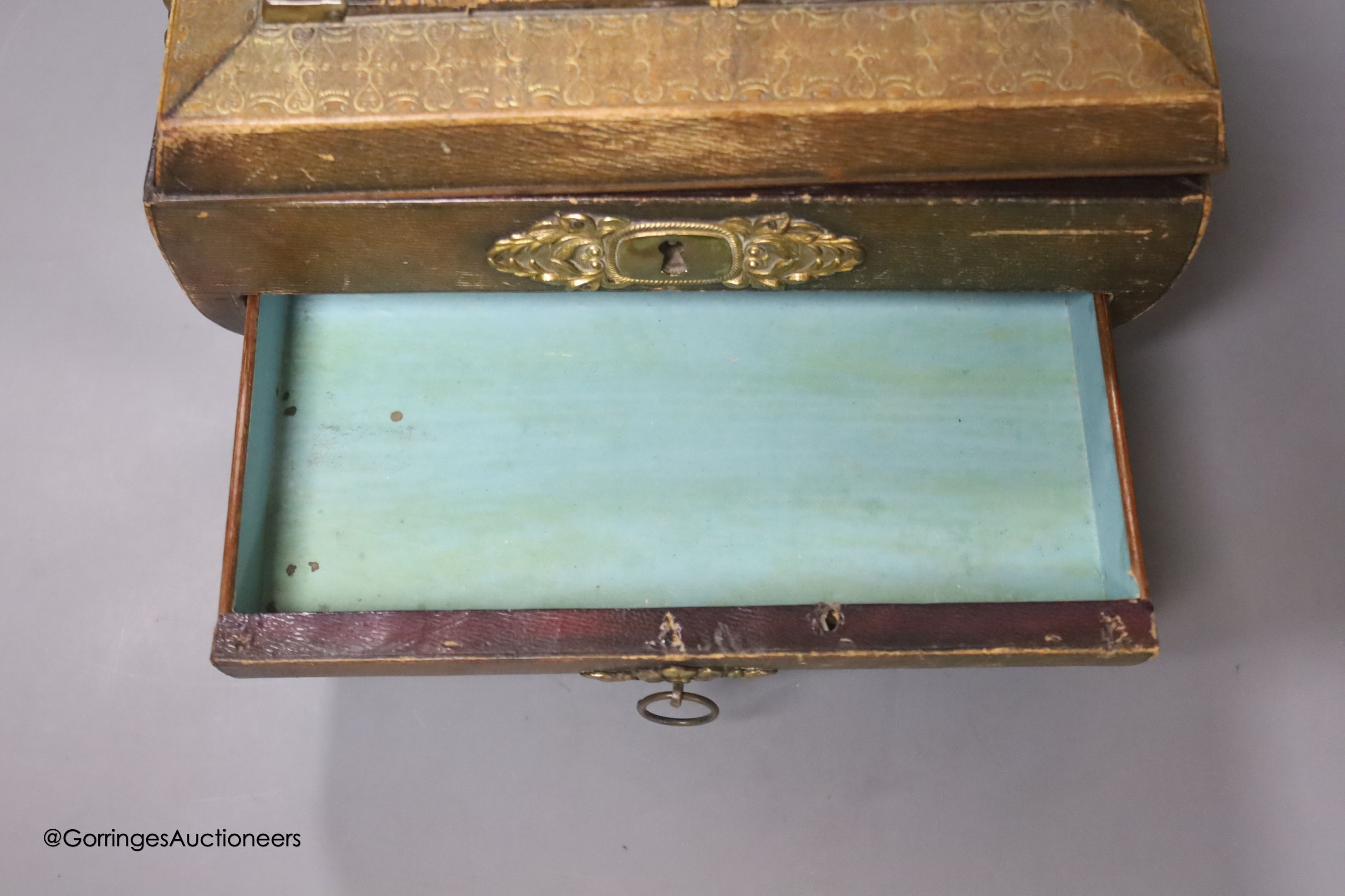 A Regency stamped brass mounted leather covered sewing box, 24cm (a.f.)